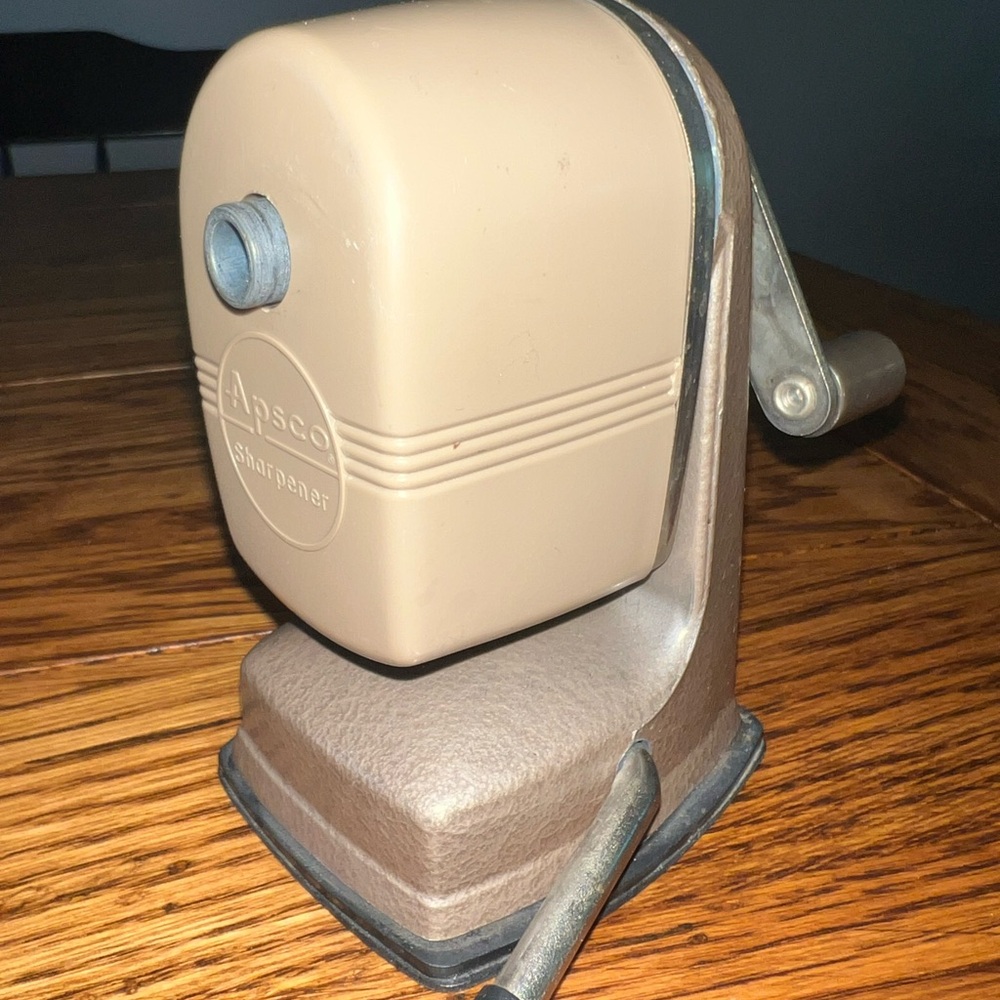 Vintage Tan Pencil Sharpener w/ suction on bottom.